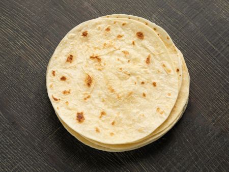 Roti are made to uniformed size and weight