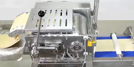 An additional Dough Sheeting Cutter can increase the degree of Empanada production automation