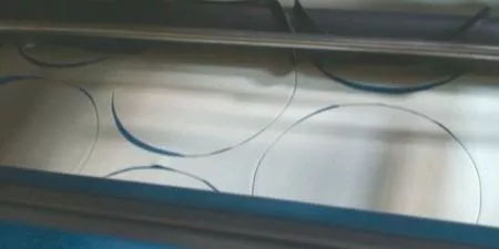 Different sized roller cutters can be used for producing pita breads with different diameters.