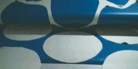 The excess dough is removed from the perfectly cut pita, and the pita breads are ready for baking.