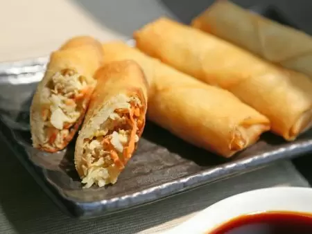 Spring Rolls made with a mixture of crunchy vegetable filling and meat which is not mushy