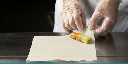 Finish rolling the products by hand