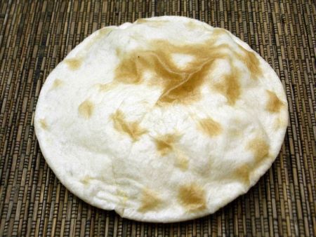 O calor produz um bolsão de ar quente no pão pita