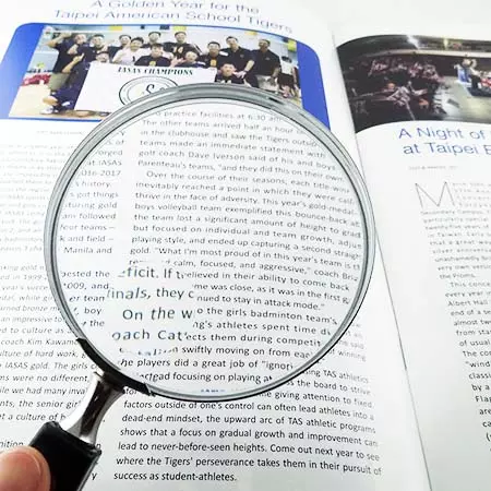 Hand held magnifying glass for reading