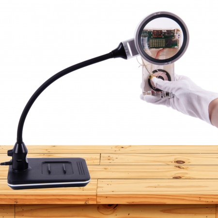 LED light magnifier enlarge precision objects.