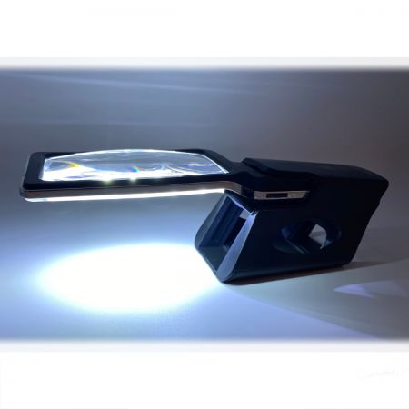 supporto per una lente d'ingrandimento illuminata a LED al buio