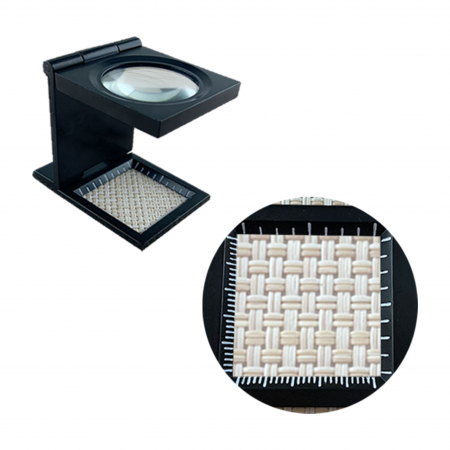 La lente d'ingrandimento LED Flooding Loupe ingrandisce oggetti di precisione.