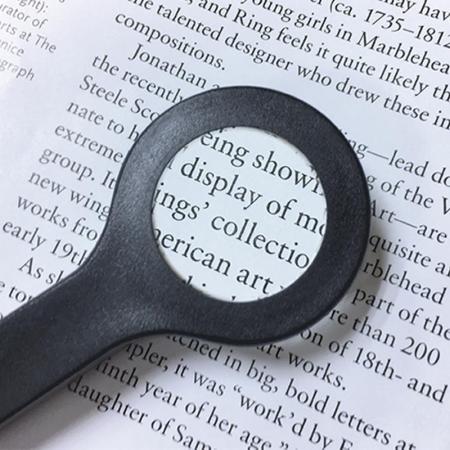 Lupa de pinza de metal