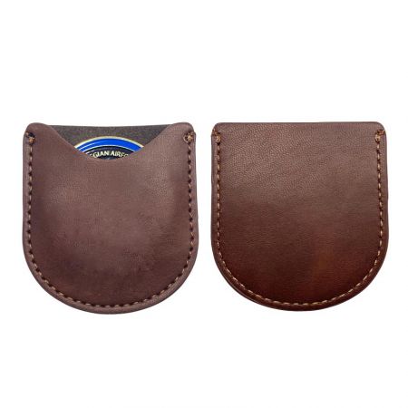 Porte-pièces de défi en cuir