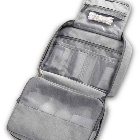 Foldable hanging toiletry organizer made from rPET with mesh pockets, zipper compartments, and transparent storage sections.