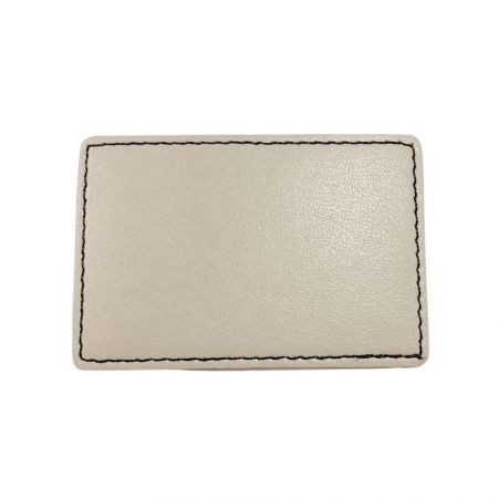 patch in pelle vuota all'ingrosso con retro termoadesivo