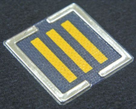 Broderte epauleter