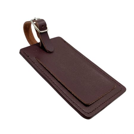 Back side view of leather luggage tag with privacy flap