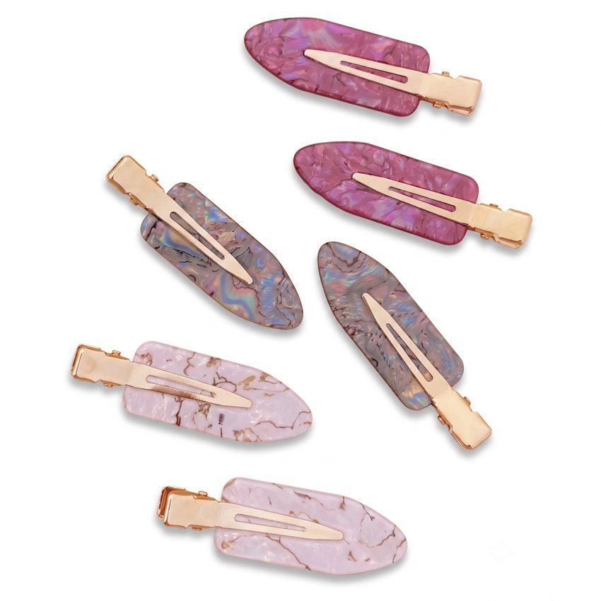 Custom acrylic no crease hair clips in premium marble finishes with gold metal clips, available in multiple custom colors and patterns.