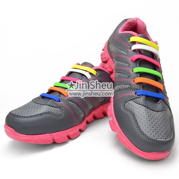 A pair of sneaker with no tie silicone shoelaces