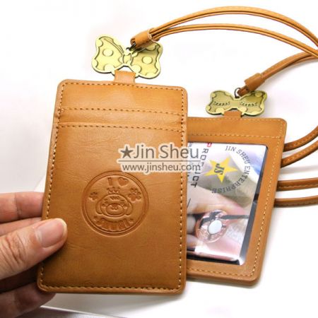 leather card holder with metal charm