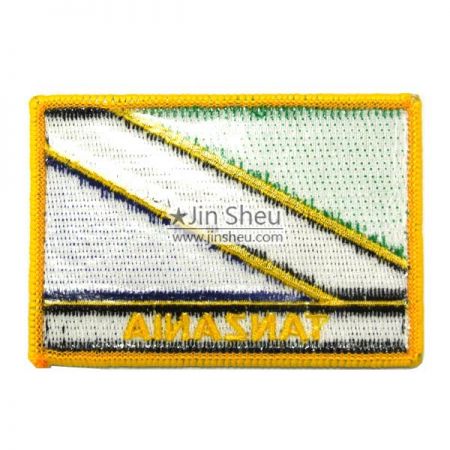 Patches de drapeau de Tanzanie avec cadre jaune à l'arrière