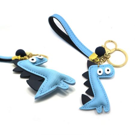 индивидуальный динозавр из мягкой кожи брелок