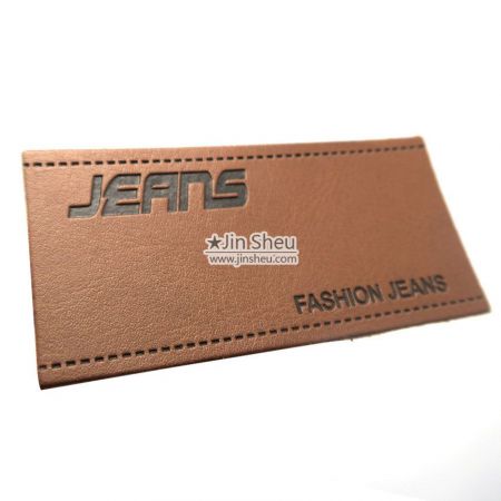 etichette in pelle marrone personalizzate per jeans