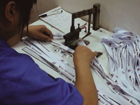 Customised Lanyard Cutting & Sealing - Lanyard cutting and sealing process before attachment is assembled