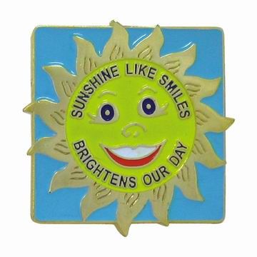 Spille in ottone stampato smaltate