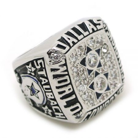 Cowboys super bowl rings feature the team's colors and logo, as well as the year of their victory.