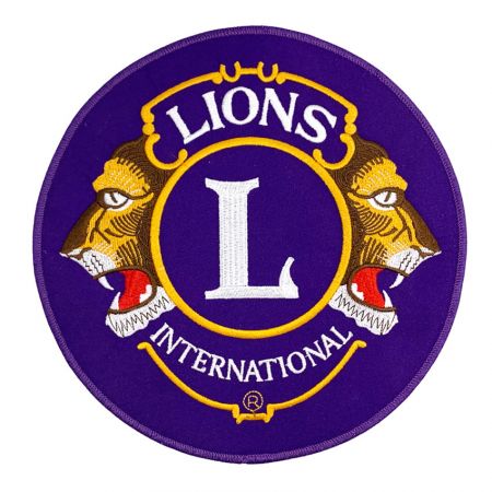 Groot embleem van Lions International