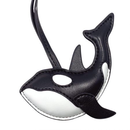 Leather Handbag Charms - close up view of leather bag charm in a killer whale design