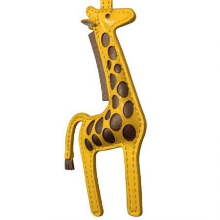 Leather Purse Charms - close up view of leather purse charm in a giraffe design