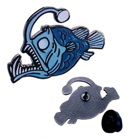 anglerfish lapel pin showing front and back