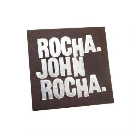 индивидуальная кожаная этикетка с серебряным тиснением