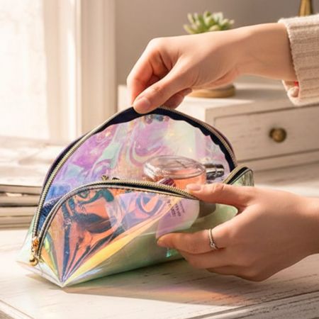 Waterproof travel toiletry bag with items inside the opened bag