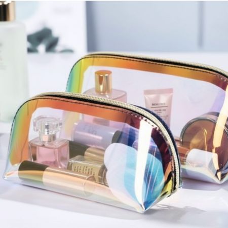 Transparent makeup pouches full of cosmetics inside both pouches