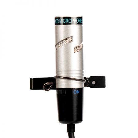 Metal housing tie-clip microphone with integrated battery.