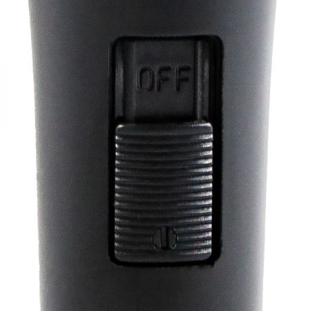 Handheld microphone with button to activate the microphone