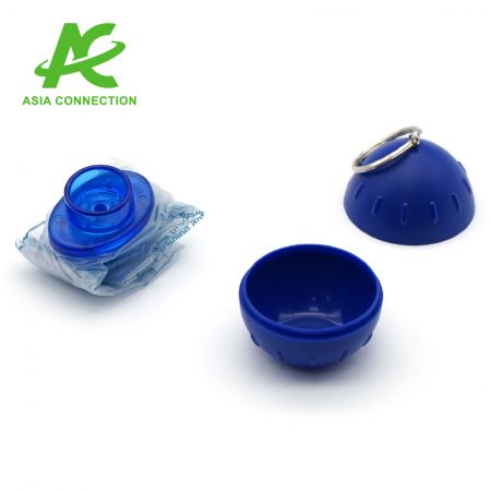 A full set of a CPR Mouth Barrier includes a CPR face shield with a one-way valve and bite block and a ball shape keychain case.
