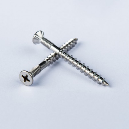 Flat Head Phillips Drive Tapping Screw - Flat head Phillips Drive Tapping Screw w/ 4 Ribs under the Head and Collated.