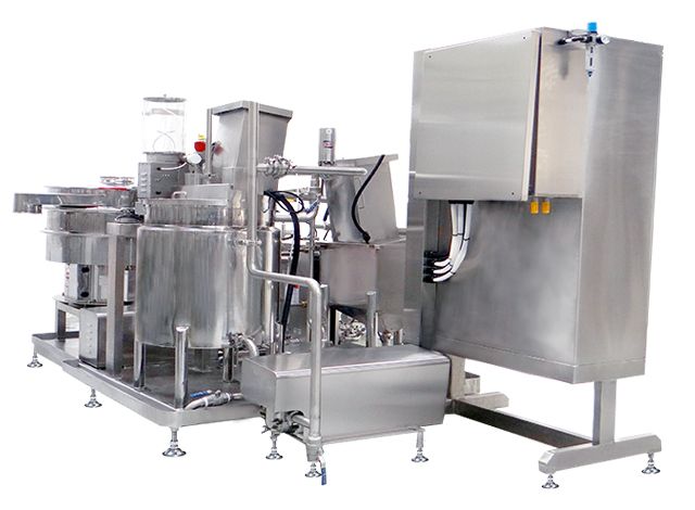 Оборудование для свертывания соевого молока - одна из машин в японской линии производства шелковистого тофу.