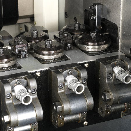 Feed set of camless spring forming machine.