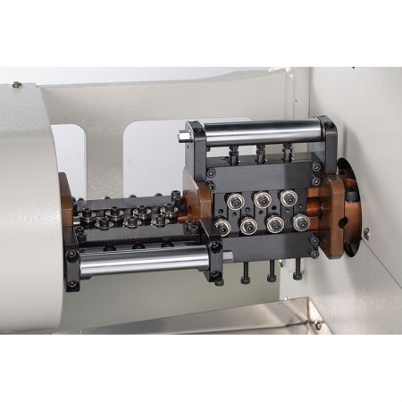 Meccanismo di raddrizzamento della macchina per la formatura di molle senza camme rotanti a filo.