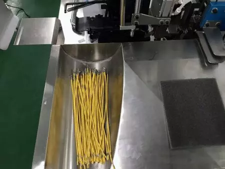 Automatic Electronic cable cutting stripping and crimping.
