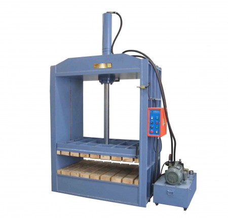 Hydraulic Baling Press - Pressing finished woven Mats into solid bundles.