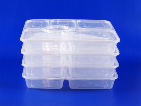 Sechs versiegelte Kunststoff-Mittagessenboxen sind ordentlich gestapelt.