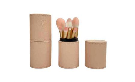 7-Piece PU Leather Cylinder Makeup Brush Set - 7-Piece Leather Brush Set with fine-textured bristles and a portable pink cylinder case.