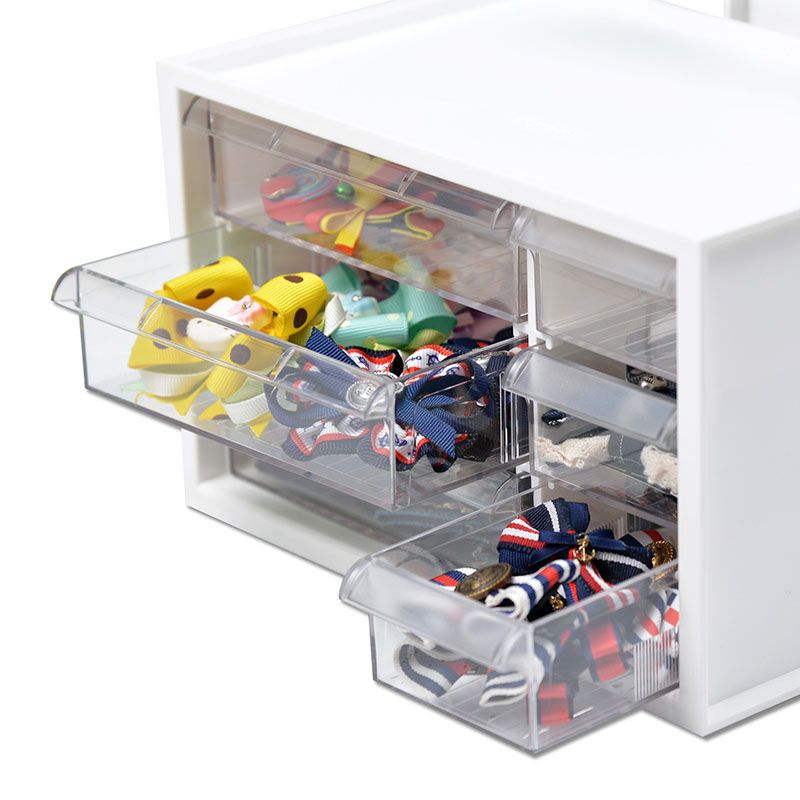 Small plastic desktop organizer with 6 drawers