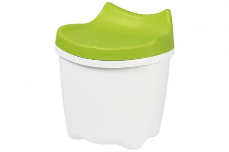 Perabot duduk-dan-simpan LaChatte yang lucu untuk anak-anak dalam warna hijau.