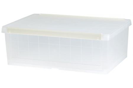 Drop-down door storage box in clear.