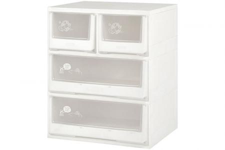 Flat-pack dresser with 4 assorted drawers in clear.