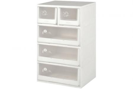 Flat-pack dresser with 5 assorted drawers in clear.