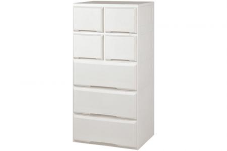 Flat-pack dresser with 7 assorted drawers in white.